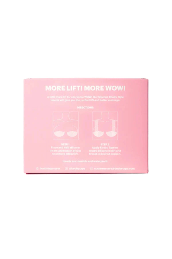 Silicone Booby Tape Inserts (A–C) by Booby Tape, soft waterproof silicone pair designed to lift and enhance cleavage. Reusable and lightweight.