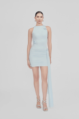 Azahar Arctic by Maygel Coronel – A trendy mini dress with memory-shape fit, draped skirt, side sash, and 3D flowers, perfect for chic events and nights out.