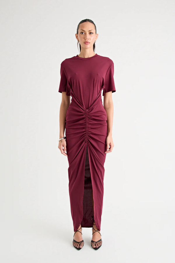 Niko Maxi Dress Burgundy by Pfeiffer – Trendy relaxed T-shirt maxi with adjustable side ruching, crew neck, and breathable cotton blend, perfect for elevated off-duty style and everyday comfort.