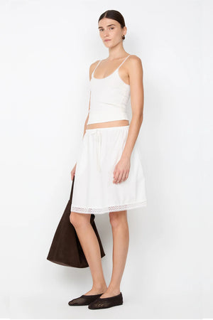 Emerson Tank in Ivory by Bec + Bridge, a ribbed cotton tank with sheer tulle trim and scoop neckline. Perfect for everyday layering or polished looks.