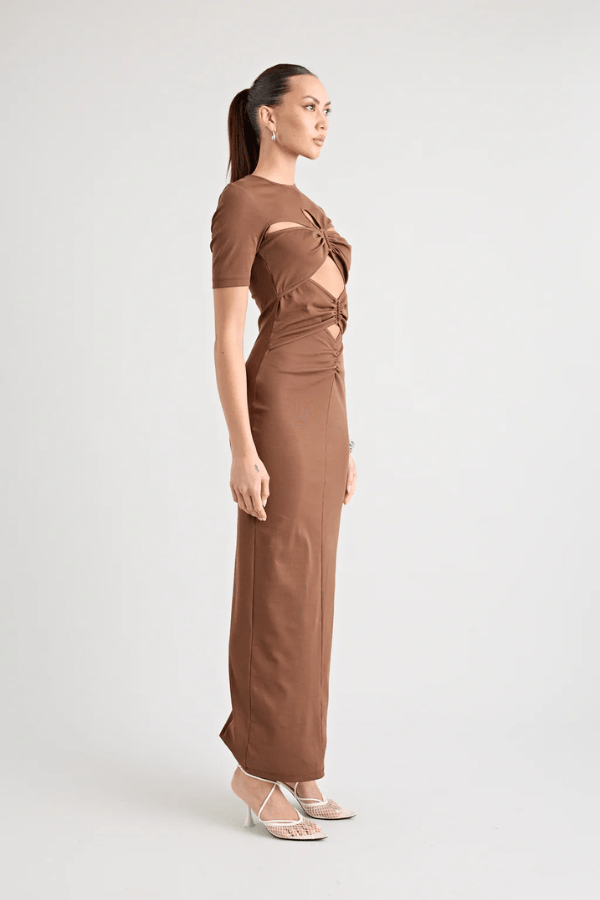 Florence Dress Chocolate by Pfeiffer – A chic fitted maxi with cut-out hardware accents in buttery soft fabric, perfect for stylish, ethical day-to-night looks.