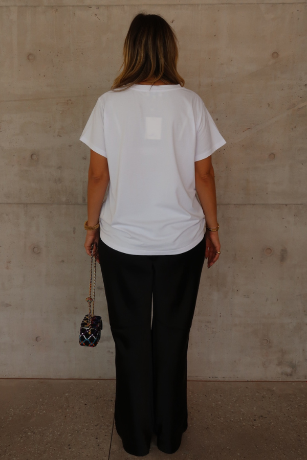 White Tee by Sneaky Link – Trendy loose-fit 100% cotton classic white tee, perfect as a versatile staple for every capsule wardrobe and casual style.