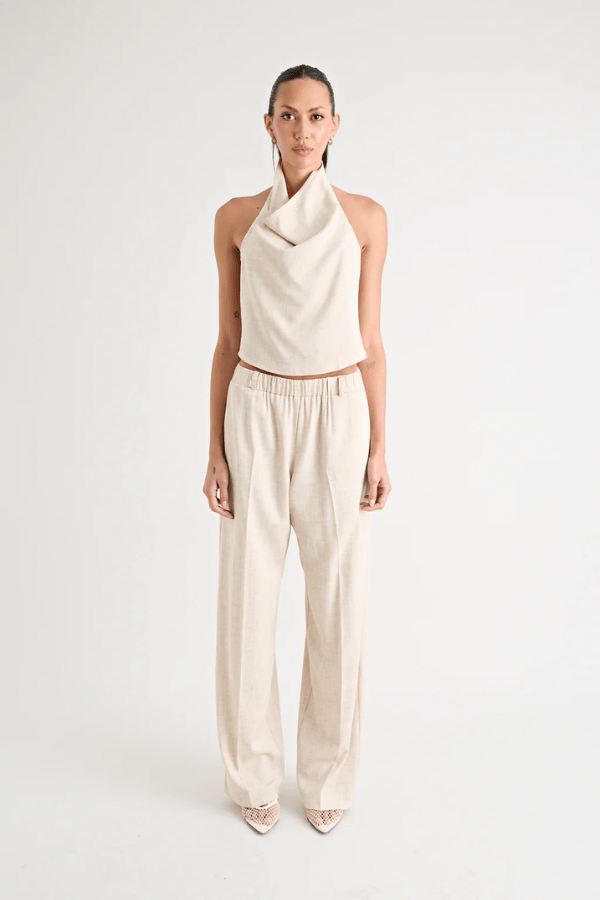 Pino Cowl Top Natural by Pfeiffer – Trendy, soft suiting top with adjustable cowl neckline and cinched back, perfect for chic day-to-night elegance.