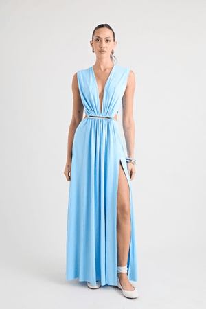 Do For Love Gown Light Blue by Pfeiffer – A trendy, elegant maxi with a deep plunge, thigh-high split, and bold hardware, perfect for special occasions and evening events.