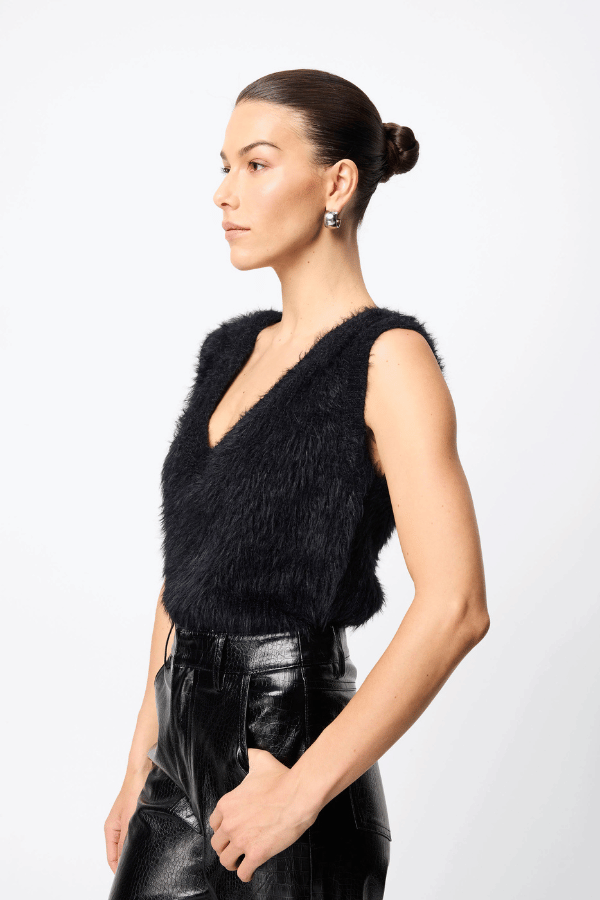 Slumber Vest Black by Mossman – Cozy yet chic high-loft knit vest with relaxed fit and V-neckline, perfect for layering or standalone style.