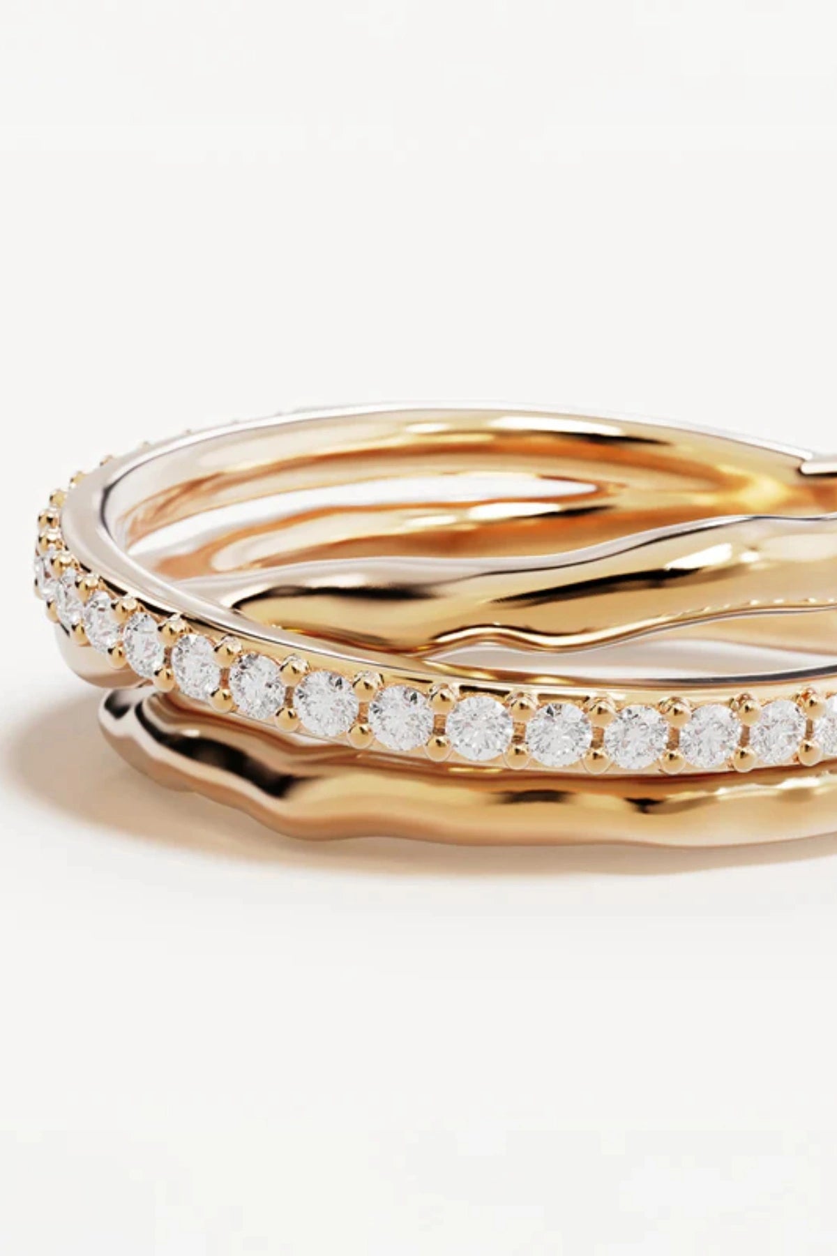 Entwined Hearts Ring by By Charlotte — a sterling silver double-band ring with CZ crystals, symbolising intertwined love and timeless elegance.