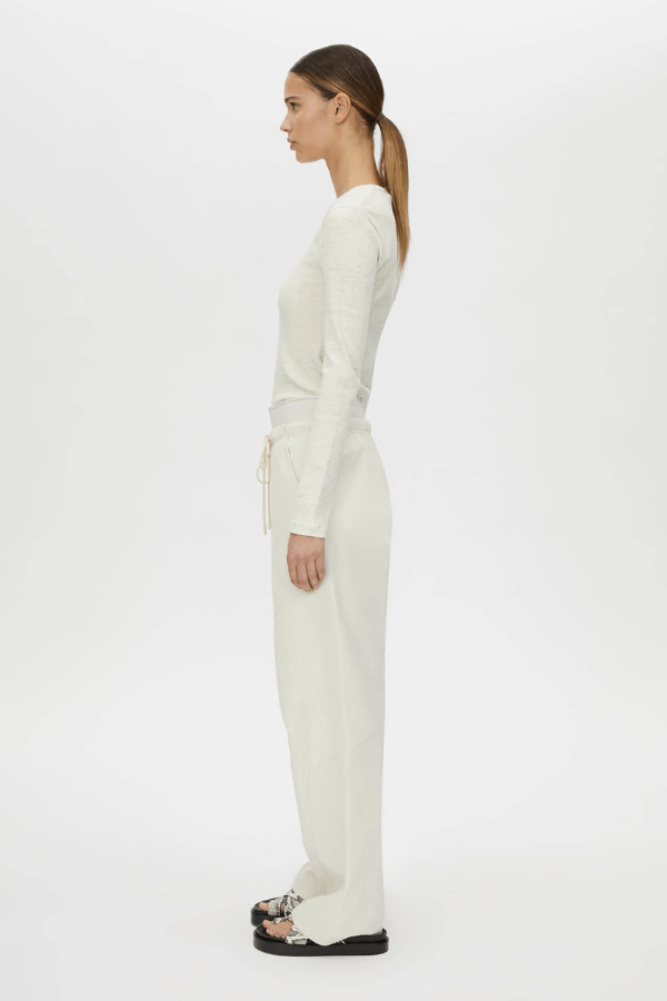 Cella Monogram Elastic Pant White by Camilla and Marc, relaxed mid-rise pants with monogram waistband, slant pockets, and panel detailing.