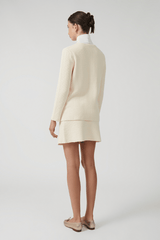 Helena Jacket Ivory by Onte – Breathable 100% cotton crochet-knit jacket with loose fit, gold buttons, crew neck, long sleeves, and patch pockets. Hand wash cold, dry flat.
