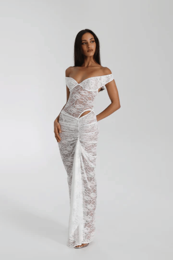 Aubrey Dress White by Natalie Rolt – Elegant lace two-piece with off-shoulder detail and cut-outs, perfect for modern brides or special soirées.