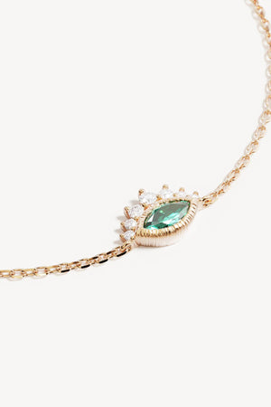 18k Gold Vermeil Hope And Protection Bracelet by By Charlotte, adjustable evil eye bracelet with blue Paraiba gemstone and cubic zirconias.