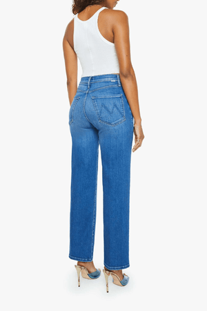 The Rambler Zip Flood Nip In The Bud by MOTHER, trendy high-rise jeans with a wide straight leg and cropped, clean hem. Perfect for a laid-back, polished look in mid-blue with subtle fading and whiskering.