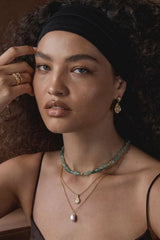 Mersin Earrings by Amber Sceats, 24K gold plated statement earrings with crushed texture and cubic zirconia detailing.