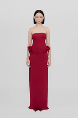 Calliope Dress Carmesi by Maygel Coronel – Strapless maxi dress with waist ruffles in iconic stretch fabric; bold, sleek, and sun-ready.