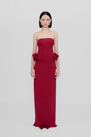 Calliope Dress Carmesi by Maygel Coronel – Strapless maxi dress with waist ruffles in iconic stretch fabric; bold, sleek, and sun-ready.