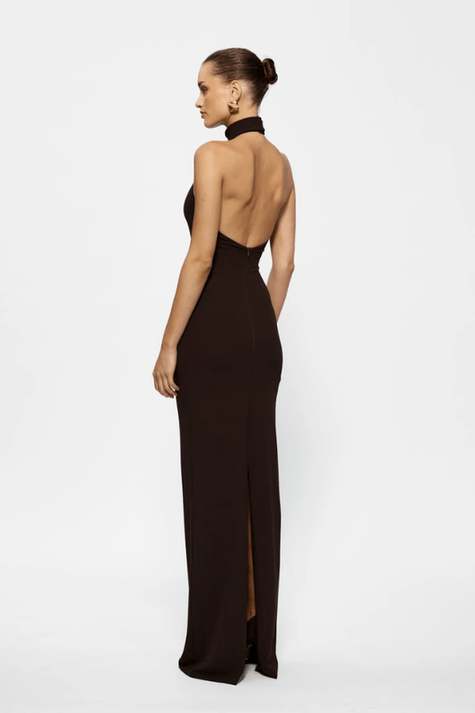 Rhi Gown Coffee by Effie Kats, a stretch crepe floor-length gown with high neck and open back. Perfect for timeless, elegant occasions.