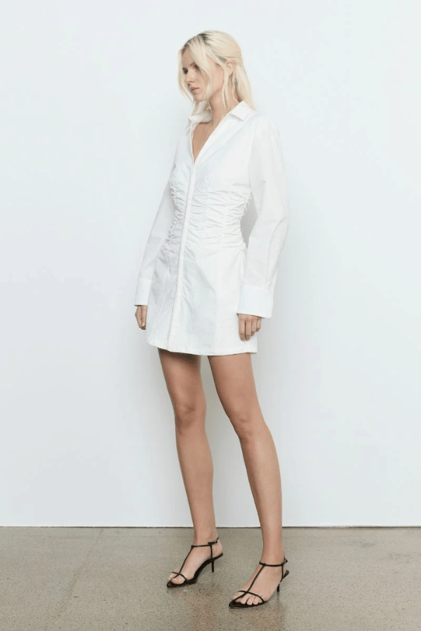 Incarnation Shirt Dress Chalk by Sovere Studio – A trendy, breathable cotton shirt dress in classic chalk with relaxed fit and button details. Perfect for casual or formal styling.