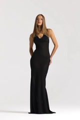 Anita Dress Black by Natalie Rolt featuring a sheer georgette silhouette, draped cowl neckline and asymmetrical skirt godets.