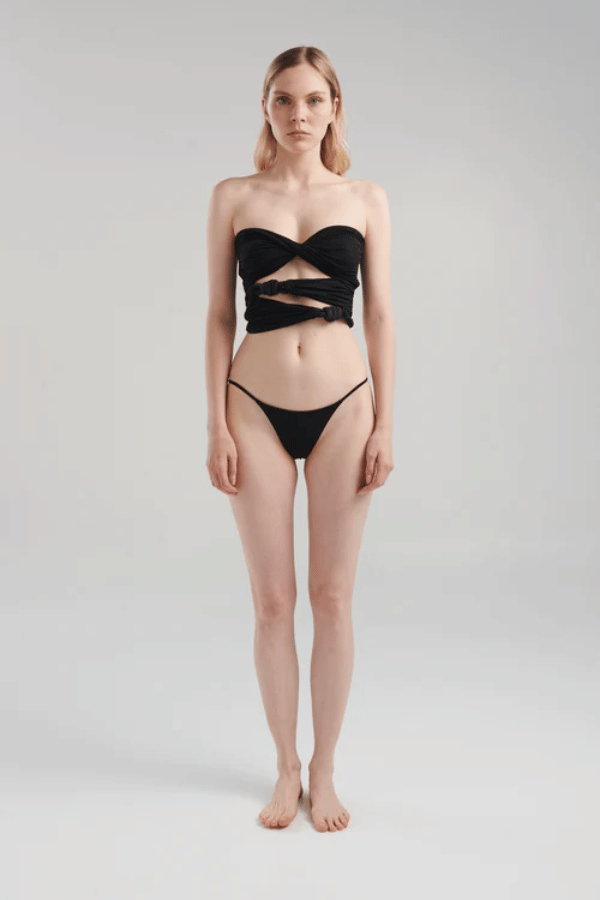 Atarraya Black by Maygel Coronel, sculpted fit with two handmade knots and elegant draping, perfect for trendy viral looks that highlight your silhouette.