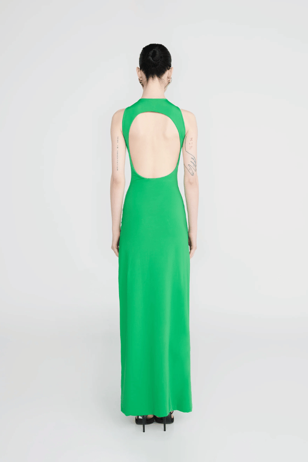 Tirso Spring Green by Maygel Coronel – Long dress with round neck, open back, ruched sash, and 3D flowers for elegant look.