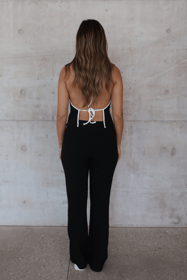 Charlie Halter Top Black/White by Sneaky Link - Trendy summer staple with chic halter neckline and open back. Perfect for beach days or viral nightlife vibes.
