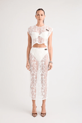 Astrid Lace Top White by Pfeiffer, dreamy lace with keyhole back and relaxed fit, perfect for trendy viral layering over bras or bikinis and chic day-to-night styles.