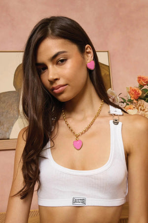 Hot Hearts Necklace by Emma Pills, a candy pink enamel heart pendant on adjustable gold-plated chain for bold, playful styling.