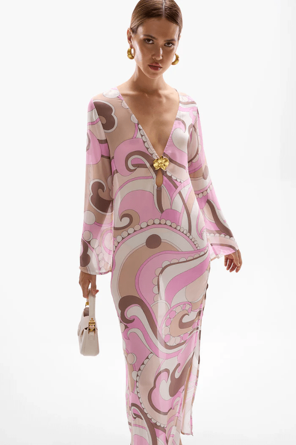 Hotline Orchid Maxi Dress Antibes by Cin Cin – A viral, flowy maxi with dreamy pastel swirls, keyhole neckline, and side split, ideal for resort lounging and summer nights.