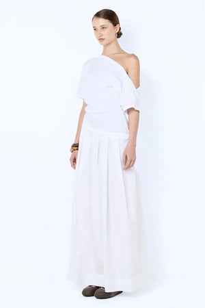 Chantal Off-Shoulder Maxi Dress by Bec + Bridge, this cotton dress features a poplin skirt and jersey bodice. Perfect for summer events.