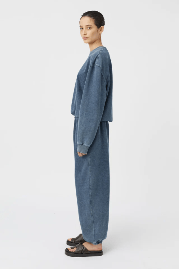 Dovell Crew Indigo by Camilla and Marc, denim fleece with saddle stitching and adjustable hem, perfect for casual days or trendy streetwear layering.