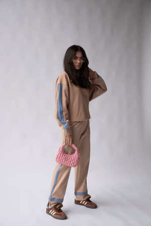Maya Knit Pant Nougat by Araminta James, soft cotton knit pants with contrast trims and split hems, perfect for chic, comfortable leisurewear looks.