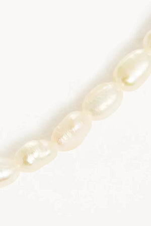 Moonlight Bracelet by By Charlotte, an 18k gold vermeil piece with freshwater pearls. Perfect for meaningful everyday layering.