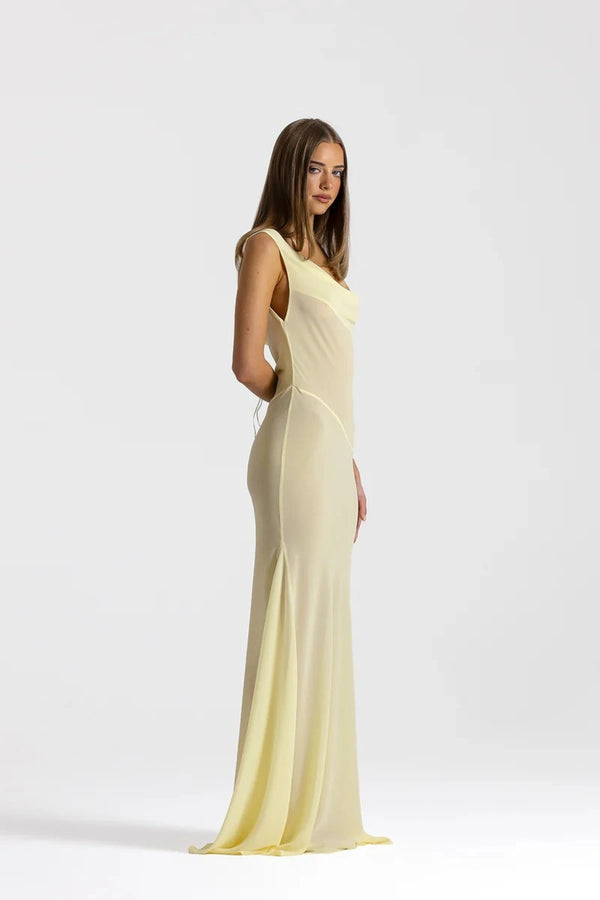 Anita Dress Lemon by Natalie Rolt featuring a sheer georgette silhouette, draped cowl neckline and asymmetrical skirt godets.