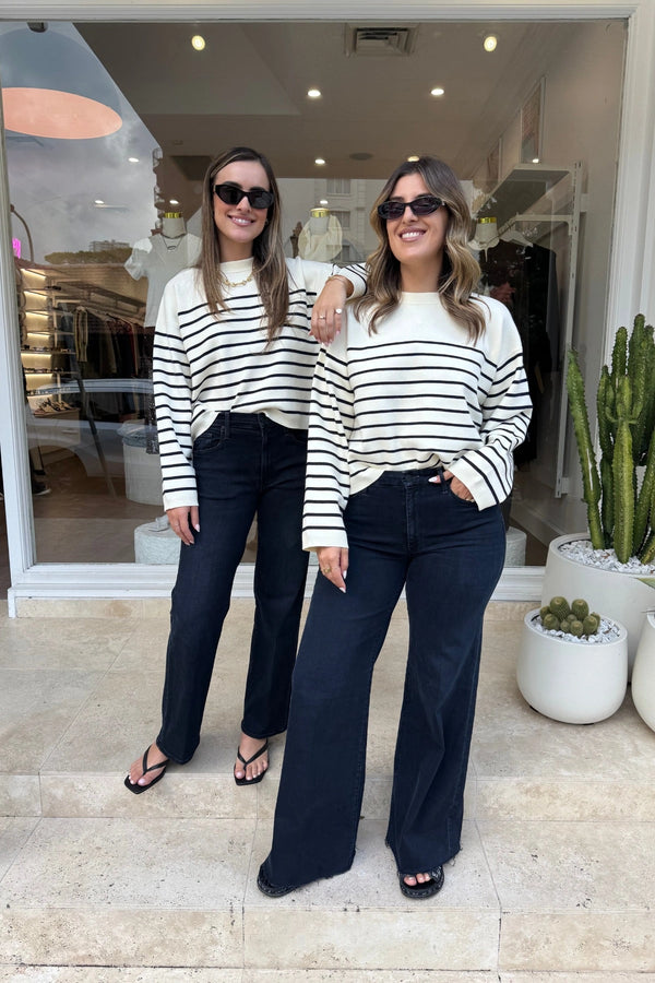 Marta Sweater Navy Breton by Onte – Soft-touch souffle knit sweater with a boxy cropped fit. Features classic navy Breton stripes, ribbed neck, cuffs, and hem. Heavyweight, relaxed A-line silhouette.