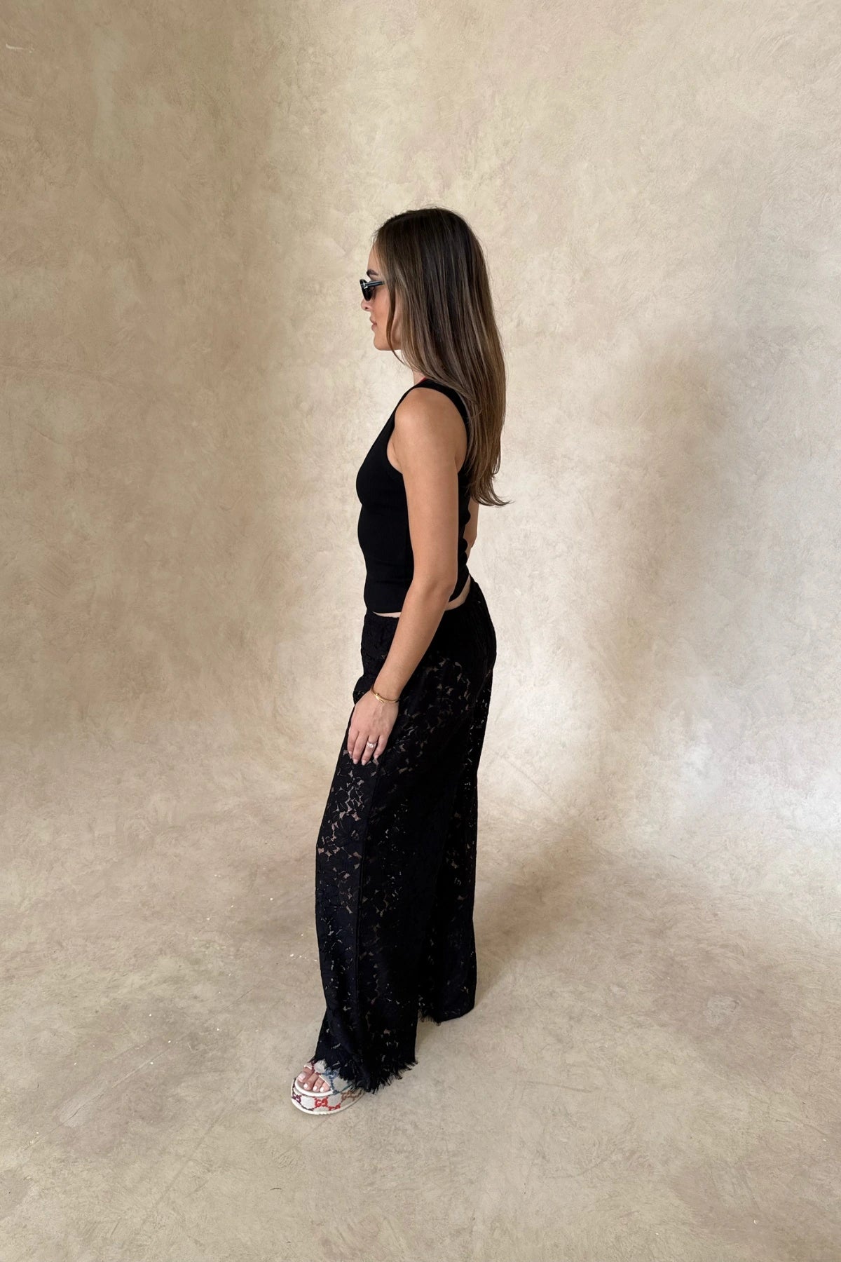 Christina Tank Black by Sneaky Link, sleek ribbed tank with scoop neckline and fitted shape. Perfect for effortless elevated basics.