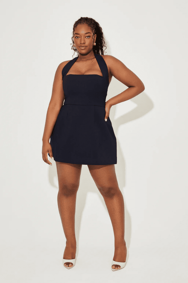 The Ultimate Muse Structured Mini Dress Navy by Odd Muse – Elegant halter mini with cinched waist and structured skirt for timeless resort style.