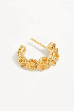 Bloom With Grace Hoops by By Charlotte, 18k gold vermeil sculptural tapered hoops with a textured floral-inspired finish.
