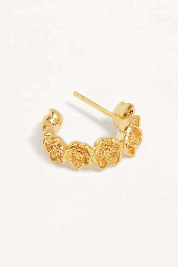 Bloom With Grace Hoops by By Charlotte, 18k gold vermeil sculptural tapered hoops with a textured floral-inspired finish.
