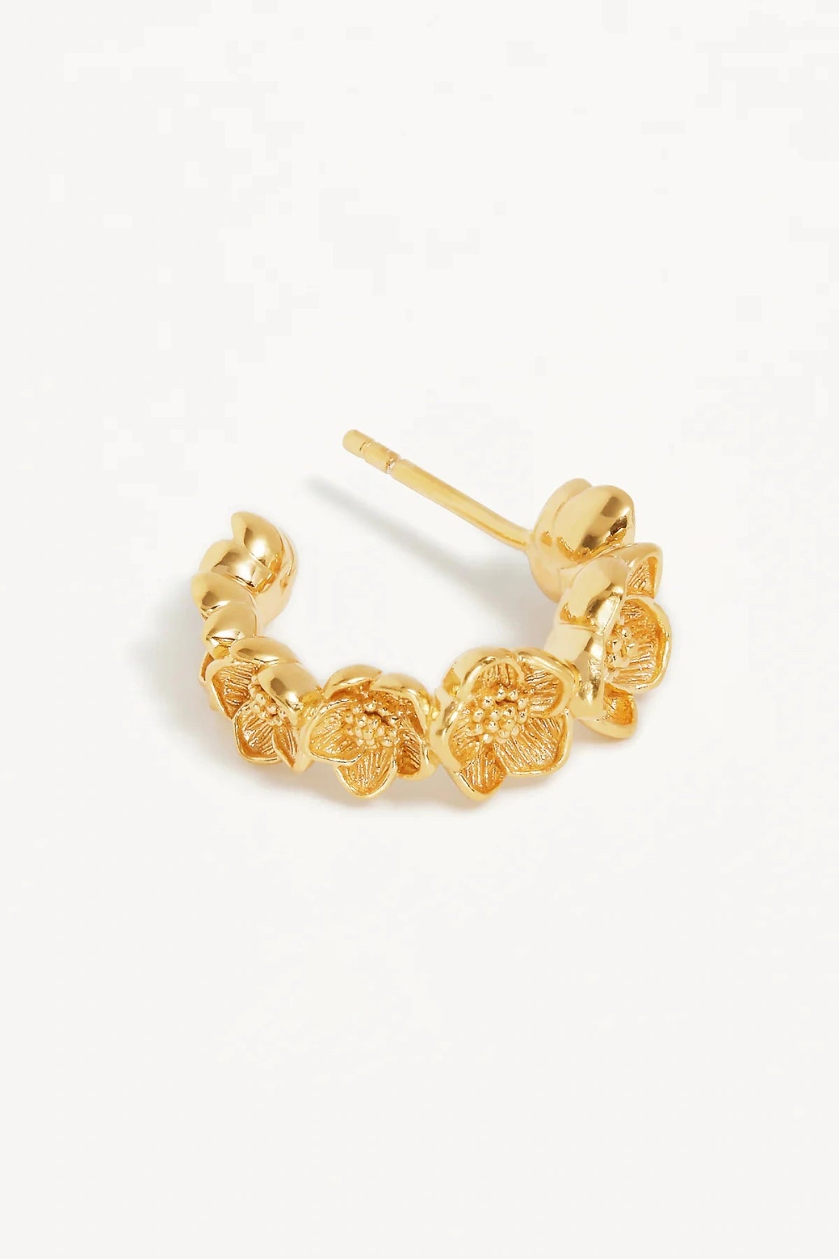 Bloom With Grace Hoops by By Charlotte, 18k gold vermeil sculptural tapered hoops with a textured floral-inspired finish.
