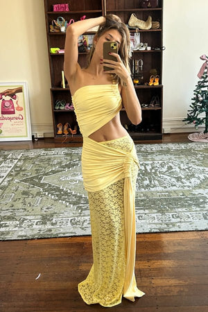 Paradiso Lace Baby Yellow by Decon Duarte – Elegant and adaptable lace set with adjustable mini skirt and sheer maxi overlay, perfect for standout events.