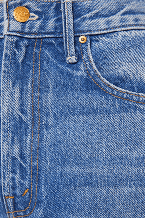 The Lemon Twist Rolling In The Dough by MOTHER, rigid wide-leg jeans with playful candy hardware. Perfect for standout off-duty styling.