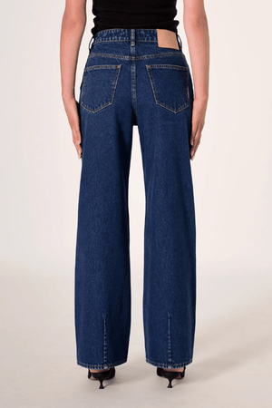 Coco Relaxed Indigo Vision by Neuw Denim, high-waisted relaxed straight-leg rigid jeans in vintage indigo with tobacco stitching, perfect for casual wear.