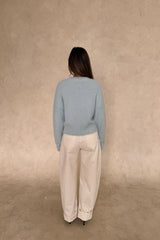 Blue Kaia crew neck sweater with long sleeves and a relaxed fit.
