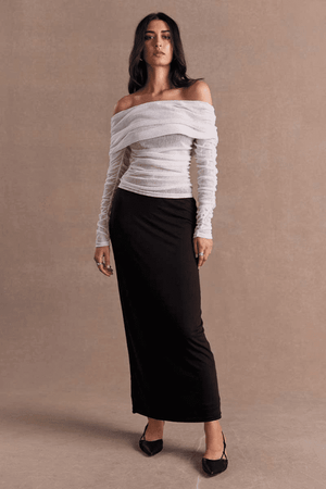 Emara Sleeveless Mini Dress Black by Sovere – fitted mini dress with pleats, keyhole neckline, tie details, and back zipper.