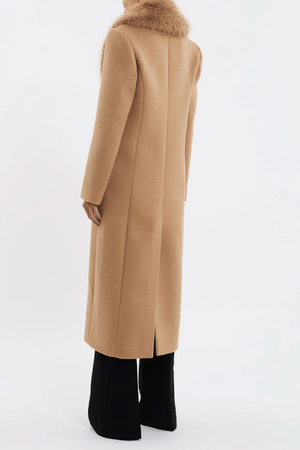 Biera Coat Camel by Rebecca Vallance – Timeless boxy double-breasted wool coat with embossed dome buttons and removable faux fur trim. Features flap pockets, back vent, and full lining.