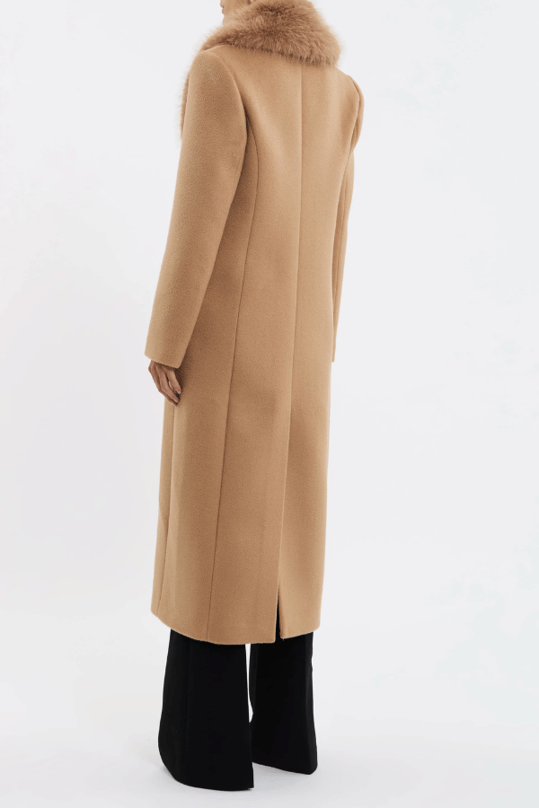 Biera Coat Camel by Rebecca Vallance – Timeless boxy double-breasted wool coat with embossed dome buttons and removable faux fur trim. Features flap pockets, back vent, and full lining.
