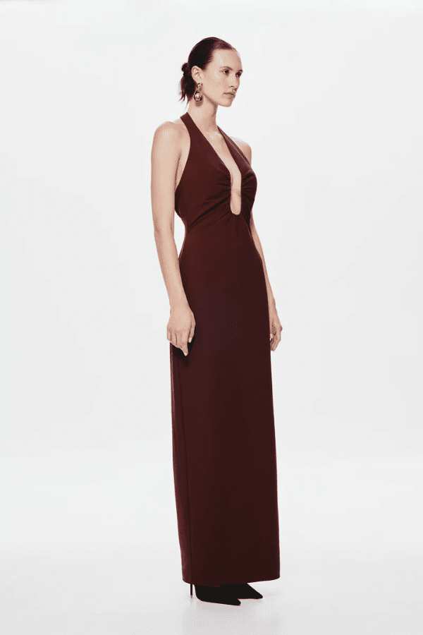 The 'Alusia' Dress Port by Misha, stretch twill maxi with sculptural halter neckline, bust cutout, side split, slim fit, cold hand wash.
