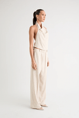 Pino Cowl Top Natural by Pfeiffer – Trendy, soft suiting top with adjustable cowl neckline and cinched back, perfect for chic day-to-night elegance.