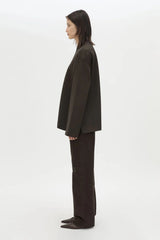 Bessette Long Sleeve Top in Espresso by Camilla and Marc, a sleek high-neck layer with side splits and tonal seam detailing.
