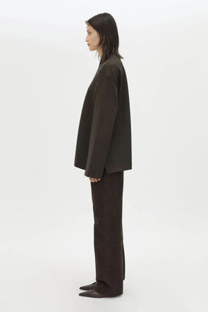 Bessette Long Sleeve Top in Espresso by Camilla and Marc, a sleek high-neck layer with side splits and tonal seam detailing.