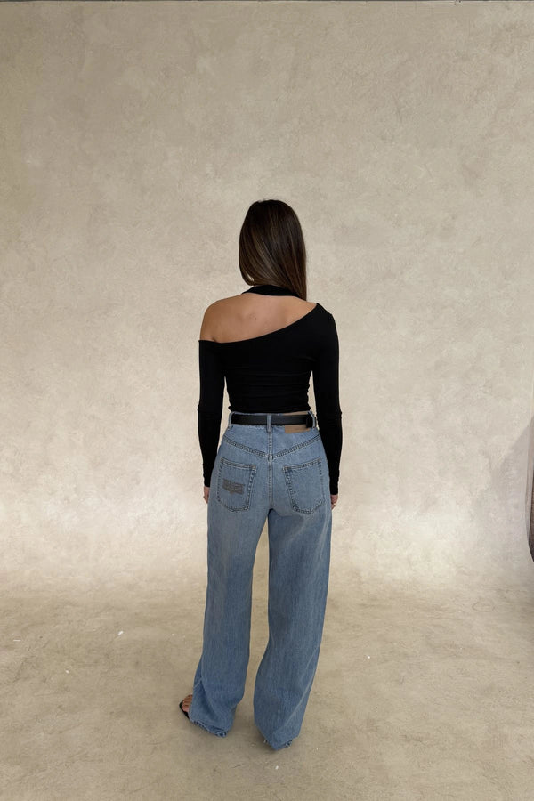 Issy Long Sleeve Top Black by Sneaky Link – Luxuriously soft modal-spandex with an off-shoulder neckline and built-in halter for support. Delicate fabric; handle gently. Cold hand wash.